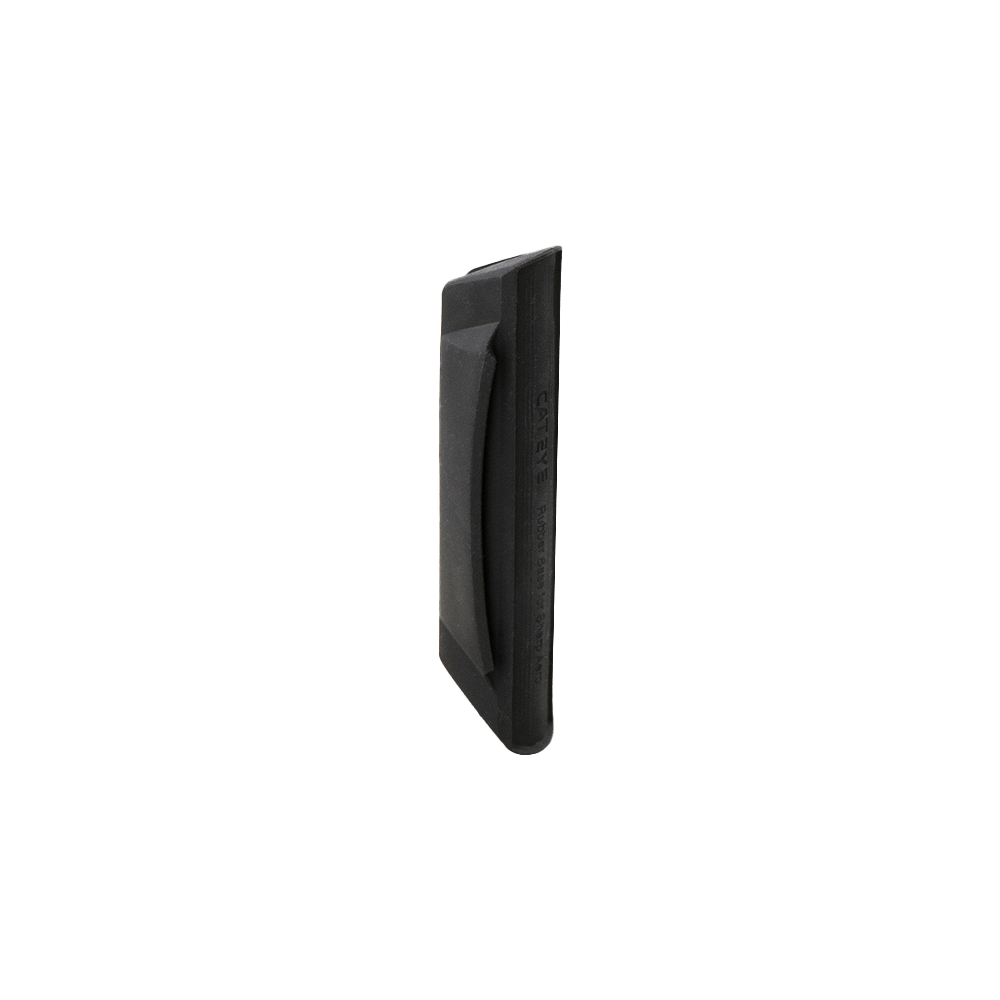 The CATEYE Sharp Aero Rubber Base for Rapid X2/X3 is a black, rectangular plastic tool with a slightly curved handle and rubber base, designed as a hand squeegee or scraper; shown angled on a transparent background.