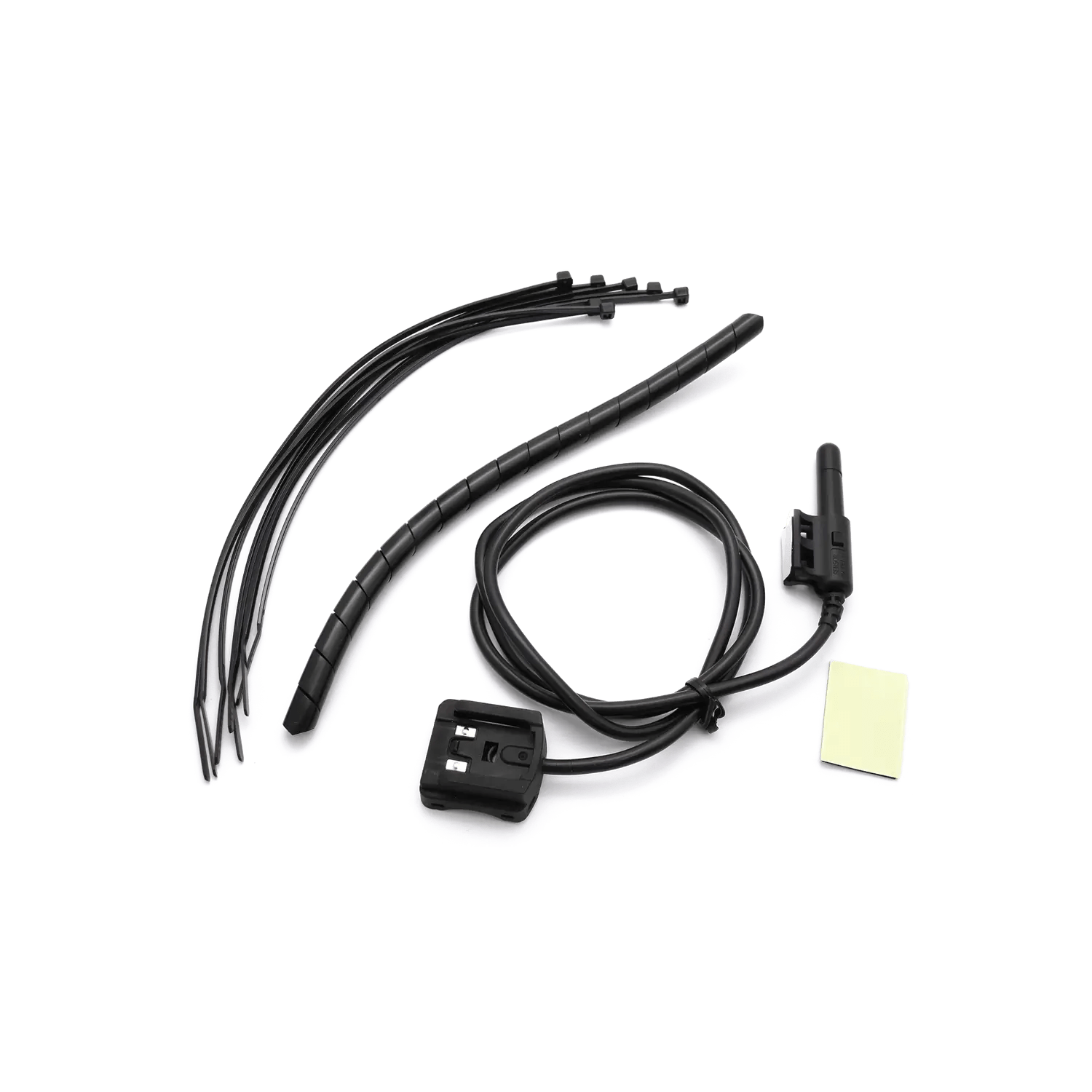 A set of black CATEYE Enduro Bracket/Sensor components—cables, connectors, zip ties, a flexible cable cover, and an adhesive pad—arranged on white; ideal for securely mounting your cycling computer.