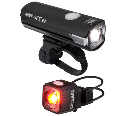 The CATEYE AMPP400S & NANO60 set includes a black USB-C front LED headlight with OptiCube lens labeled AMPP 400 and a rear red taillight, both featuring mounting straps for easy bike attachment.