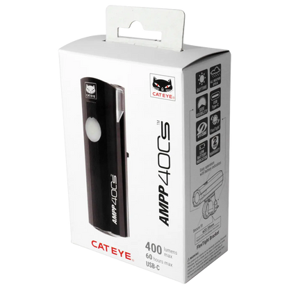 A retail box of the CATEYE AMPP400S bike light, showing a product image, USB-C charging port info, brightness and battery details, plus CATEYE branding in black, white, and red.