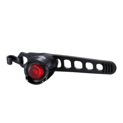 The CATEYE ORB Rechargeable is a compact black LED bike safety light with a red lens and adjustable rubber strap, shown on a white background.